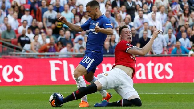 However, the defining moment of the match came when Phil Jones (R) fouled Eden Hazard in the penalty area. (REUTERS)
