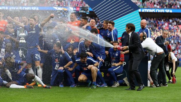 That didn’t stop Conte from joining in on the celebrations. (Action Images via Reuters)