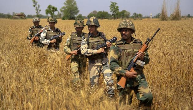 BSF personnel patrol along the international border in Jammu on Sunday. (PTI File Photo) BSF personnel patrol along the international border in Jammu on Sunday. (PTI File Photo)