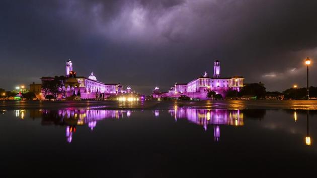 A view of North Block and South Block along with their reflections in the rain water following a thunderstorm in New Delhi on May 13, 2018. (PTI Photo) A view of North Block and South Block along with their reflections in the rain water following a thunderstorm in New Delhi on May 13, 2018. (PTI Photo)