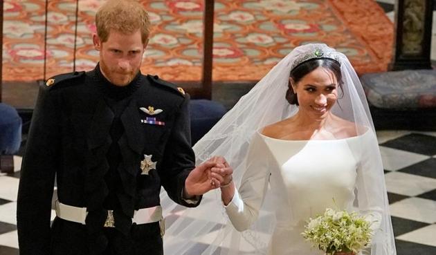 Prince Harry and Meghan Markle in St George's Chapel at Windsor Castle during their wedding service. (REUTERS) Prince Harry and Meghan Markle in St George's Chapel at Windsor Castle during their wedding service. (REUTERS)