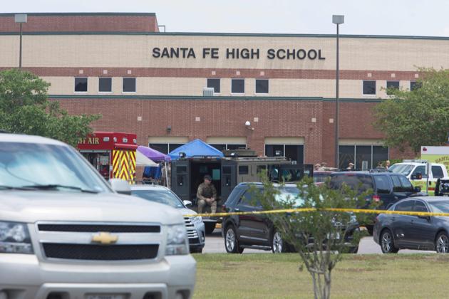 Emergency crews gather in the parking lot of Santa Fe High School where at least eight students were killed on May 18, 2018.(AFP File Photo)