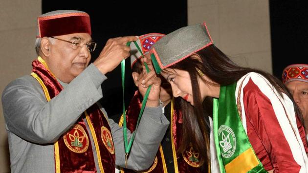 President Ram Nath Kovind presents medal to a student at the 9th convocation of Dr YS Parmar University of Horticulture & Forestry in Solan, Himachal Pradesh on Monday. (PTI Photo)