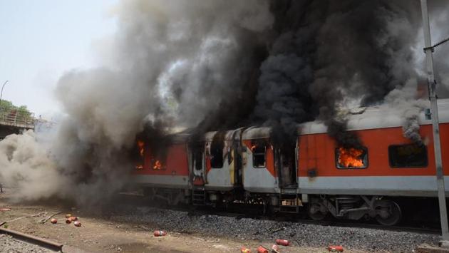 Two coaches of Andhra Pradesh AC Superfast Express going from Hazrat Nizamuddin station in New Delhi to Vishakhapatnam in Andhra Pradesh caught fire near Birlanagar station in Gwalior on Monday. There were no reports of any casualty. (HT Photo) Two coaches of Andhra Pradesh AC Superfast Express going from Hazrat Nizamuddin station in New Delhi to Vishakhapatnam in Andhra Pradesh caught fire near Birlanagar station in Gwalior on Monday. There were no reports of any casualty. (HT Photo)