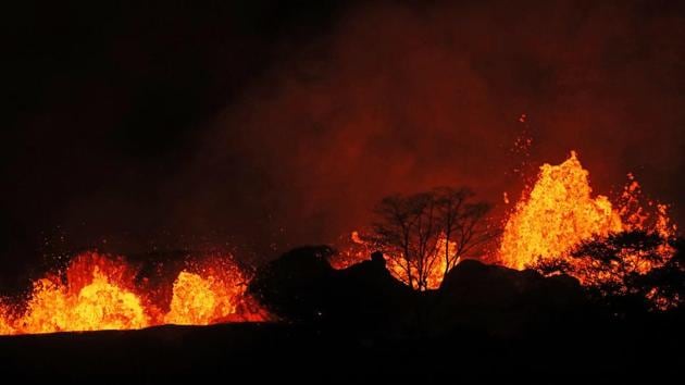Kilauea, one of the world’s most active volcanoes, began extruding red-hot lava and sulphuric acid fumes through newly opened fissures on the ground along its eastern flank on May 3, marking the latest phase of an eruption cycle that has continued nearly non-stop for 35 years. (Jamm Aquino / Honolulu Star-Advertiser / AP) Kilauea, one of the world’s most active volcanoes, began extruding red-hot lava and sulphuric acid fumes through newly opened fissures on the ground along its eastern flank on May 3, marking the latest phase of an eruption cycle that has continued nearly non-stop for 35 years. (Jamm Aquino / Honolulu Star-Advertiser / AP)