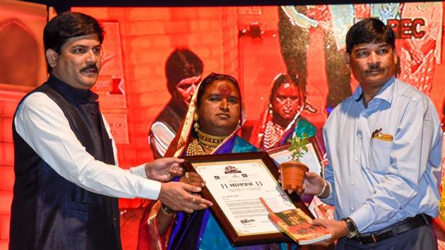 Mauli Kamble, a transwoman and sarpanch of a village in Malshej area of Maharashtra, being felicitated by the sponsors of the event, at Balgandharva Rang Mandir on Sunday. (SANKET WANKHADE/HT PHOTO) Mauli Kamble, a transwoman and sarpanch of a village in Malshej area of Maharashtra, being felicitated by the sponsors of the event, at Balgandharva Rang Mandir on Sunday. (SANKET WANKHADE/HT PHOTO)