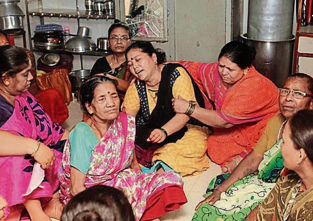 Family members of one of the victims, Roshan Singh, mourn their loss at Wagle Estate on Monday. (Representational photo) Family members of one of the victims, Roshan Singh, mourn their loss at Wagle Estate on Monday. (Representational photo)