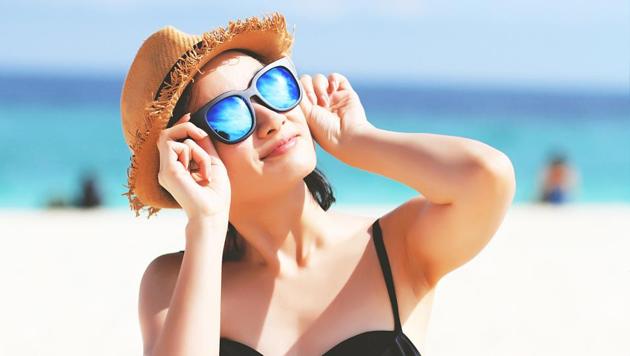 Apply a layer of sunscreen before stepping out.(iStockphoto)