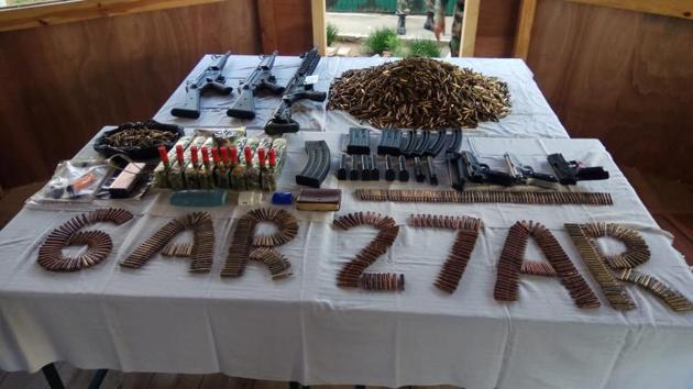 The illegal arms and ammunition recovered from Ukhrul district on Monday. (HT Photo) The illegal arms and ammunition recovered from Ukhrul district on Monday. (HT Photo)