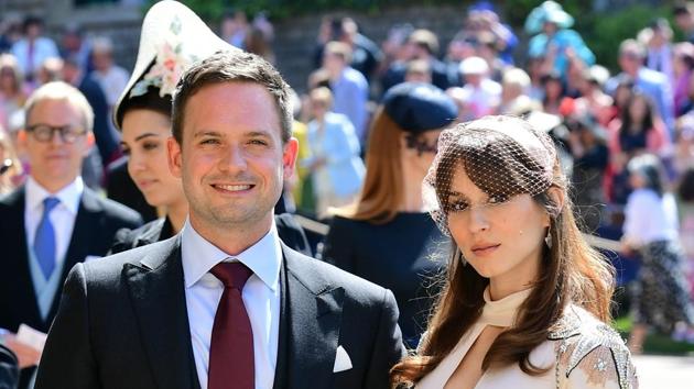 Meghan Markle's friend, US actor Patrick J. Adams and wife Troian Bellisario arrive for the wedding ceremony of Britain's Prince Harry, Duke of Sussex and US actress Meghan Markle at St George's Chapel, Windsor Castle.(AFP)