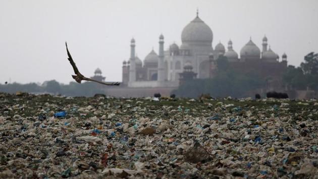 Garbage is seen on the polluted banks of the river Yamuna near Agra’s Taj Mahal. The 17th century mausoleum is turning yellow and green under filthy air in the world’s eighth-most polluted city. Tiny insects from the drying Yamuna, into which the city pours its sewage crawl into the Taj Mahal, their excrement further staining the marble, an environmental lawyer told the Supreme Court. (Saumya Khandelwal / REUTERS) Garbage is seen on the polluted banks of the river Yamuna near Agra’s Taj Mahal. The 17th century mausoleum is turning yellow and green under filthy air in the world’s eighth-most polluted city. Tiny insects from the drying Yamuna, into which the city pours its sewage crawl into the Taj Mahal, their excrement further staining the marble, an environmental lawyer told the Supreme Court. (Saumya Khandelwal / REUTERS)