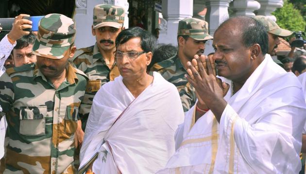 JD(S) leader and Karnataka chief minister-designate H D Kumaraswamy visits Manjunatha Swamy temple ahead of the swearing-in ceremony, at Kshetra Dharmasthala in Dharmasthala, Karnataka. (PTI Photo) JD(S) leader and Karnataka chief minister-designate H D Kumaraswamy visits Manjunatha Swamy temple ahead of the swearing-in ceremony, at Kshetra Dharmasthala in Dharmasthala, Karnataka. (PTI Photo)
