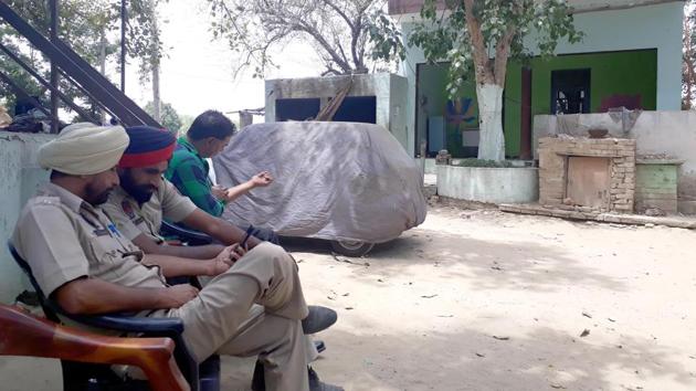 Police officials outside the dera at Jandu Singha village in Adampur, Jalandhar, on Monday. (Pardeep Pandit/HT) Police officials outside the dera at Jandu Singha village in Adampur, Jalandhar, on Monday. (Pardeep Pandit/HT)