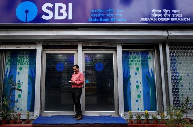 State Bank of India (SBI) reported its deepest-ever quarterly loss on Tuesday, far beyond estimates, as the Reserve Bank of India set aside more provisions for bad loans after a change in banking regulation. Gross bad loans as a percentage of total loans rose to 10.91% from 10.35% three months earlier and 6.90% a year prior, SBI said. (Rupak De Chowdhuri / REUTERS File) State Bank of India (SBI) reported its deepest-ever quarterly loss on Tuesday, far beyond estimates, as the Reserve Bank of India set aside more provisions for bad loans after a change in banking regulation. Gross bad loans as a percentage of total loans rose to 10.91% from 10.35% three months earlier and 6.90% a year prior, SBI said. (Rupak De Chowdhuri / REUTERS File)