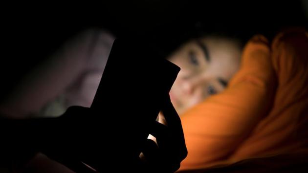 Using cell phones late at night can lead to less alertness on waking up in the morning. (Shutterstock) Using cell phones late at night can lead to less alertness on waking up in the morning. (Shutterstock)