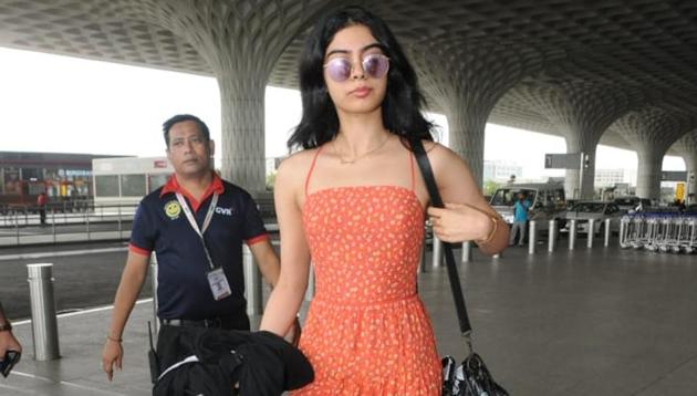Khushi Kapoor looks pretty in an orange dress. (Viral Bhayani) Khushi Kapoor looks pretty in an orange dress. (Viral Bhayani)