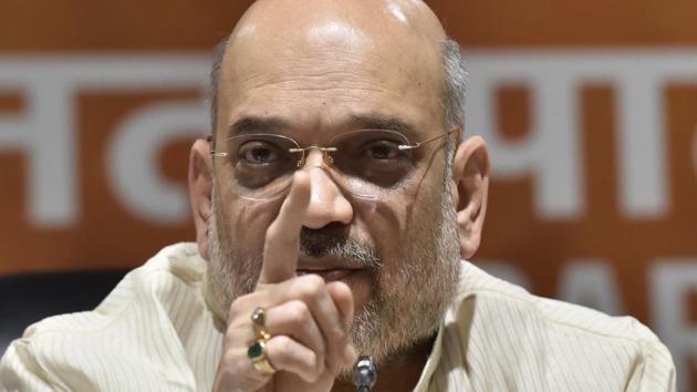 BJP national president Amit Shah addresses a press conference in New Delhi.(Sonu Mehta/HT PHOTO)