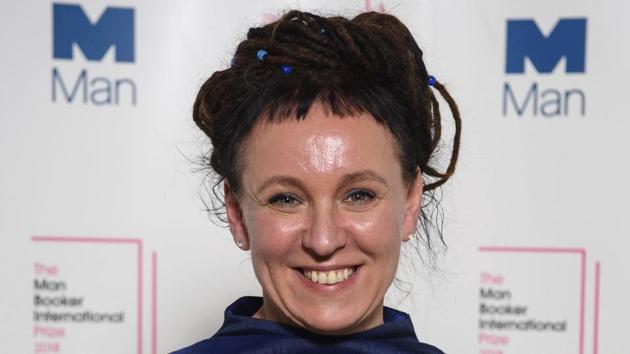 Polish author Olga Tokarczuk smiles after winning the Man Booker International prize 2018, for her book Flights, at the Victoria and Albert Museum in London.(AP)