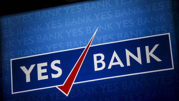 Signage for Yes Bank Ltd. is displayed at a branch in Mumbai, India, on Saturday, April 21, 2018. Yes Bank has received the Reserve Bank of India's (RBI) approval to open two representative offices in?London and Singapore.?Photographer: Dhiraj Singh/Bloomberg(Dhiraj Singh/Bloomberg)