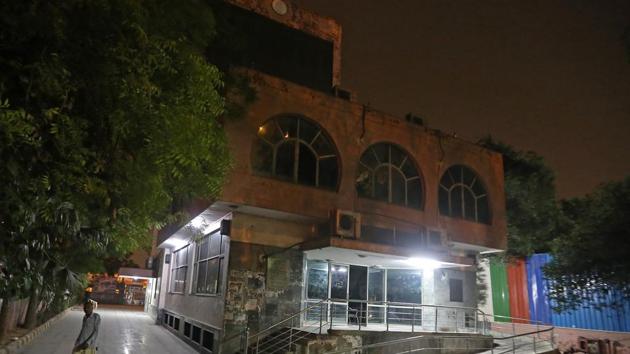 A pedestrian walks past a state office of the Indian National Congress (INC) party at night in New Delhi. While the Bharatiya Janata Party (BJP) has already moved into its newly-built, swanky, high-walled headquarters in New Delhi, the new office of the Congress party is still under construction due to a lack of funds, said the party leader.(Anindito Mukherjee/Bloomberg) A pedestrian walks past a state office of the Indian National Congress (INC) party at night in New Delhi. While the Bharatiya Janata Party (BJP) has already moved into its newly-built, swanky, high-walled headquarters in New Delhi, the new office of the Congress party is still under construction due to a lack of funds, said the party leader.(Anindito Mukherjee/Bloomberg)