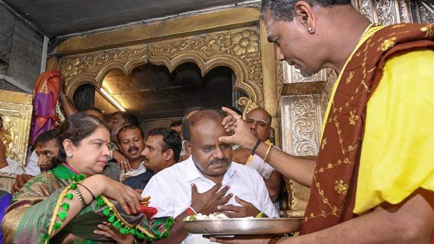 Karnataka chief minister-designate HD Kumaraswamy offers prayers at Chamundeshwari Temple ahead of his oath-taking ceremony, in Mysore. (PTI) Karnataka chief minister-designate HD Kumaraswamy offers prayers at Chamundeshwari Temple ahead of his oath-taking ceremony, in Mysore. (PTI)