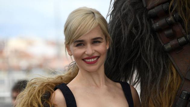 British actress Emilia Clarke (L) poses on May 15, 2018 with Chewbacca during a photocall for the film Solo : A Star Wars Story at the 71st edition of the Cannes Film Festival.(AFP)