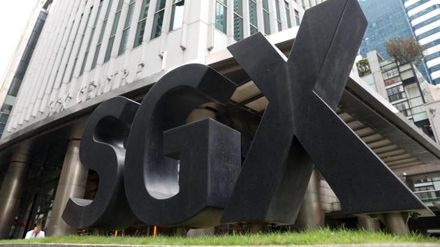 Signage for the SGX Centre, which houses the Singapore Exchange Ltd. (SGX) headquarters, stands in Singapore, on Friday, April 27, 2018. Southeast Asian leaders agreed to work intensively toward an agreement by the end of this year on plans to create what could potentially be the world’s biggest trading bloc. Photographer: Paul Miller/Bloomberg (Paul Miller/Bloomberg) Signage for the SGX Centre, which houses the Singapore Exchange Ltd. (SGX) headquarters, stands in Singapore, on Friday, April 27, 2018. Southeast Asian leaders agreed to work intensively toward an agreement by the end of this year on plans to create what could potentially be the world’s biggest trading bloc. Photographer: Paul Miller/Bloomberg (Paul Miller/Bloomberg)