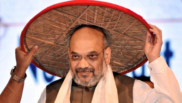 BJP president Amit Shah at the third conclave of North East Democratic Alliance meeting in Guwahati, where he promised a “Congress-free Northeast after the Mizoram polls”.(PTI File)