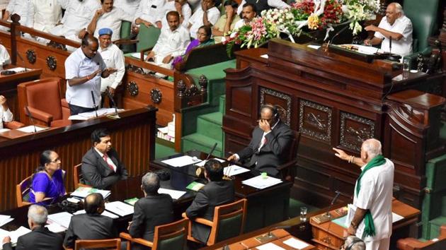 Karnataka chief minister HD Kumaraswamy won a vote of confidence in the assembly for his Congress-JD(S) coalition government. Kumaraswamy won with 117 votes after he moved the motion following the election of Congress MLA Ramesh Kumar as Speaker. BS Yeddyurappa, named the leader of opposition, threatened a state-wide stir if farm loan waivers were not waived by Monday, leading to a walk out of BJP lawmakers. (Arijit Sen / HT Photo) Karnataka chief minister HD Kumaraswamy won a vote of confidence in the assembly for his Congress-JD(S) coalition government. Kumaraswamy won with 117 votes after he moved the motion following the election of Congress MLA Ramesh Kumar as Speaker. BS Yeddyurappa, named the leader of opposition, threatened a state-wide stir if farm loan waivers were not waived by Monday, leading to a walk out of BJP lawmakers. (Arijit Sen / HT Photo)