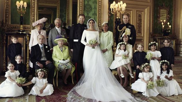 An official wedding photo of Britain's Prince Harry and Meghan Markle (C), and members of the British Royal family at Windsor Castle, England. (Alexi Lubomirski / Kensington Palace via AP)