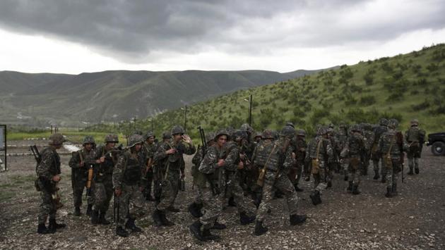 Yet there is also concern that Pashinian could aggravate already volatile conditions, where Azerbaijani and Armenian forces face off on either side of a demilitarized zone and full-scale fighting sometimes breaks out. (Thanassis Stavrakis / AP) Yet there is also concern that Pashinian could aggravate already volatile conditions, where Azerbaijani and Armenian forces face off on either side of a demilitarized zone and full-scale fighting sometimes breaks out. (Thanassis Stavrakis / AP)