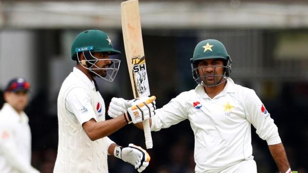 Babar Azam (L) celebrates with Sarfraz Ahmed after reaching a half century on Day 2 of the first Test between Pakistan and England at Lord’s on Friday. (Action Images via Reuters) Babar Azam (L) celebrates with Sarfraz Ahmed after reaching a half century on Day 2 of the first Test between Pakistan and England at Lord’s on Friday. (Action Images via Reuters)