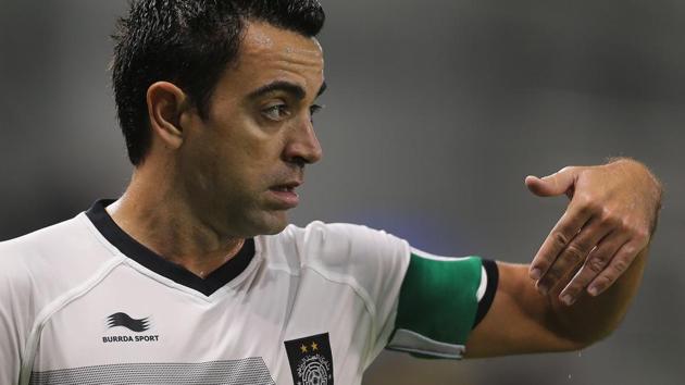 Spain football team and FC Barcelona legend Xavi Hernandez could play on till the age of 40 after he extended his contract with Qatar club Al club Al Sadd.(AFP)
