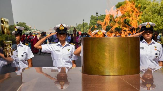 The Indian Navy’s all-woman crew of the INSV Tarini pays homage at India Gate in New Delhi. The six-member crew returned to Goa on May 21 after successfully circumnavigating the globe, on a 55ft sailboat in 254 days with 199 days at sea. (Arun Sharma / PTI) The Indian Navy’s all-woman crew of the INSV Tarini pays homage at India Gate in New Delhi. The six-member crew returned to Goa on May 21 after successfully circumnavigating the globe, on a 55ft sailboat in 254 days with 199 days at sea. (Arun Sharma / PTI)