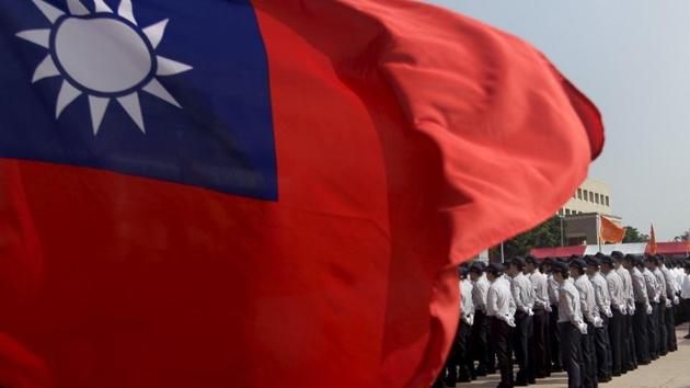 File photo of the Taiwan national flag at the National Security Bureau headquarters in Taipei.(Reuters)