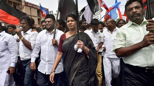 DMK MP Kanimozhi and VCK leader Thol Thirumavalavan participate in a dawn-to-dusk bandh in Tuticorin. The DMK leader was among those detained during the Tamil Nadu bandh called by the main opposition party to protest against the deaths in police firing. Kanimozhi told reporters that the Edappadi K. Palaniswami-led government has become “blood thirsty” and the chief minister should be held responsible for the deaths. (R Senthil Kumar / PTI) DMK MP Kanimozhi and VCK leader Thol Thirumavalavan participate in a dawn-to-dusk bandh in Tuticorin. The DMK leader was among those detained during the Tamil Nadu bandh called by the main opposition party to protest against the deaths in police firing. Kanimozhi told reporters that the Edappadi K. Palaniswami-led government has become “blood thirsty” and the chief minister should be held responsible for the deaths. (R Senthil Kumar / PTI)