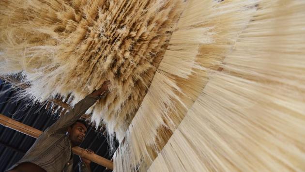 A worker makes vermicelli at a factory during ongoing fasting month of Ramzan and ahead of festival of Eid in Bhopal, Madhya Pradesh on May 22, 2018. (Mujeeb Faruqui / HT Photo)