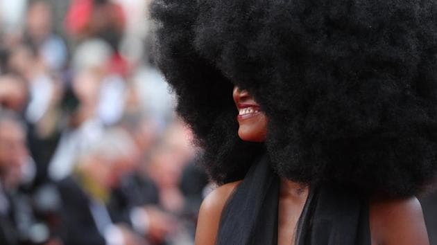 A guest arrives for the screening of the film ‘The Wild Pear Tree (Ahlat Agaci)’ at the 71st edition of the Cannes Film Festival in Cannes, southern France. (Valery Hache / AFP)