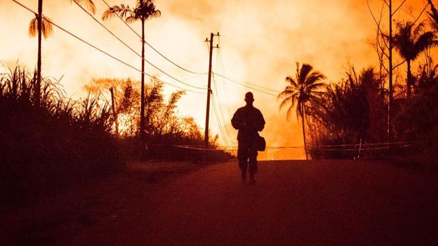 Lava spews in Kilauea's East Rift Zone in Pahoa, Hawaii amid eruptions from the Kilauea volcano. (Ronit Fahl / AFP)