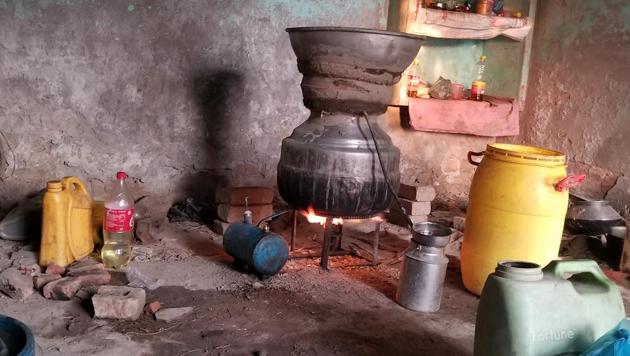 Liquor being manufactured at a shack on the banks of the Sutlej in Shahkot constituency. (HT Photo) Liquor being manufactured at a shack on the banks of the Sutlej in Shahkot constituency. (HT Photo)