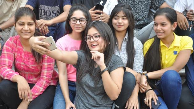 Students celebrate in Dehradun after the CBSE announced Class 12 examination results on Saturday.(HT Photo) Students celebrate in Dehradun after the CBSE announced Class 12 examination results on Saturday.(HT Photo)