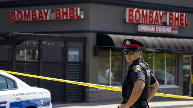 A police officer stands watch at the scene of an explosion at a restaurant in Mississauga, Ontario, on Friday, May 25, 2018.(AP Photo) A police officer stands watch at the scene of an explosion at a restaurant in Mississauga, Ontario, on Friday, May 25, 2018.(AP Photo)