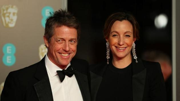 Hugh Grant and Anna Eberstein have tied the knot in a low-key ceremony in London. Here they are seen arriving for the British Academy of Film and Television Awards (BAFTA) at the Royal Albert Hall in London on February 18, 2018.(Reuters)