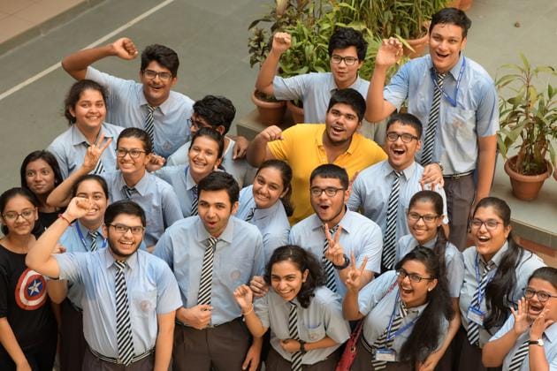 Students celebrate CBSE Class 12 results at Apeejay School, Nerul in Navi Mumbai on Saturday.(Bachchan Kumar/ HT)