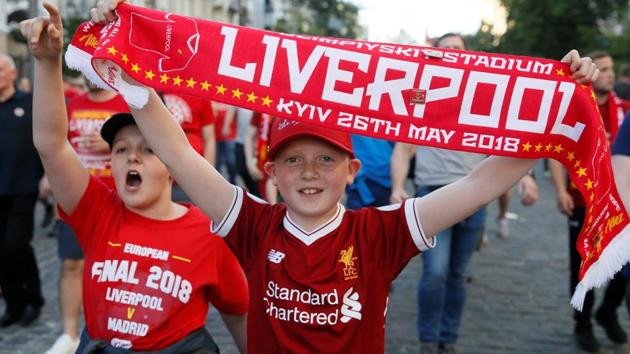 Liverpool fans celebrate ahead of their UEFA Champions League match against Real Madrid. (REUTERS) Liverpool fans celebrate ahead of their UEFA Champions League match against Real Madrid. (REUTERS)