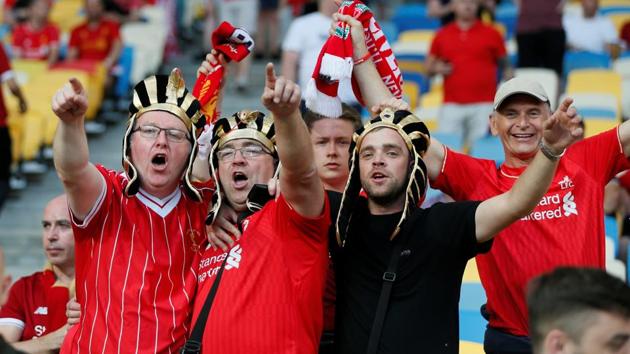 Liverpool FC fans wearing fancy dress pharaoh headpieces inside the stadium. (REUTERS) 