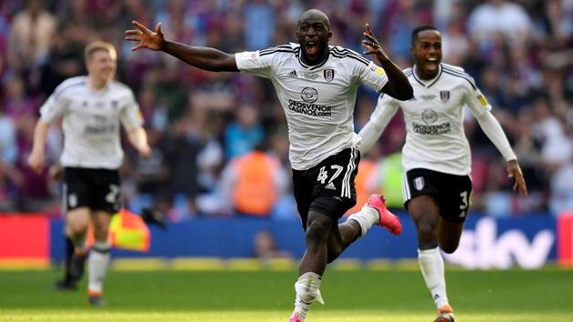 Fulham's Aboubakar Kamara celebrates promotion to the Premier League after beating Aston Villa in the championship playoff final at Wembley Stadium in London on Sunday.(Reuters)