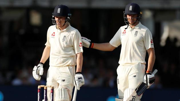 Jos Buttler’s seventh Test fifty and a half-century on debut by Dominic Bess helped England take a lead of 56 against Pakistan in the Lord’s Test.(REUTERS)