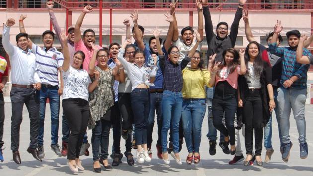 Students celebrate after the declaration Class-12 results at DAV International School in Amritsar on Saturday. (Sameer Sehgal/HT) Students celebrate after the declaration Class-12 results at DAV International School in Amritsar on Saturday. (Sameer Sehgal/HT)