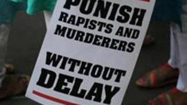 Indian protestor stands with a placard during a protest against two recently reported rape cases as they gather near the Indian parliament in New Delhi, India. (AP File Photo) Indian protestor stands with a placard during a protest against two recently reported rape cases as they gather near the Indian parliament in New Delhi, India. (AP File Photo)